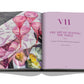 An open book showing Chapter Seven titled "The Art of Setting the Table" with a quote by Simone Weil on the right page and an image of pink glassware and flowers on a decorated tablecloth from Chateau Life by Assouline on the left page.