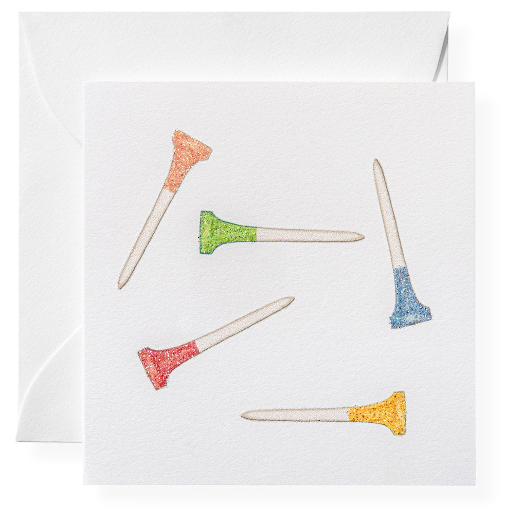 The Golf Clap Gift Enclosures by Karen Adams feature five colorful golf tees—red, orange, green, blue, and yellow—scattered on a white card, paired with a matching white envelope.