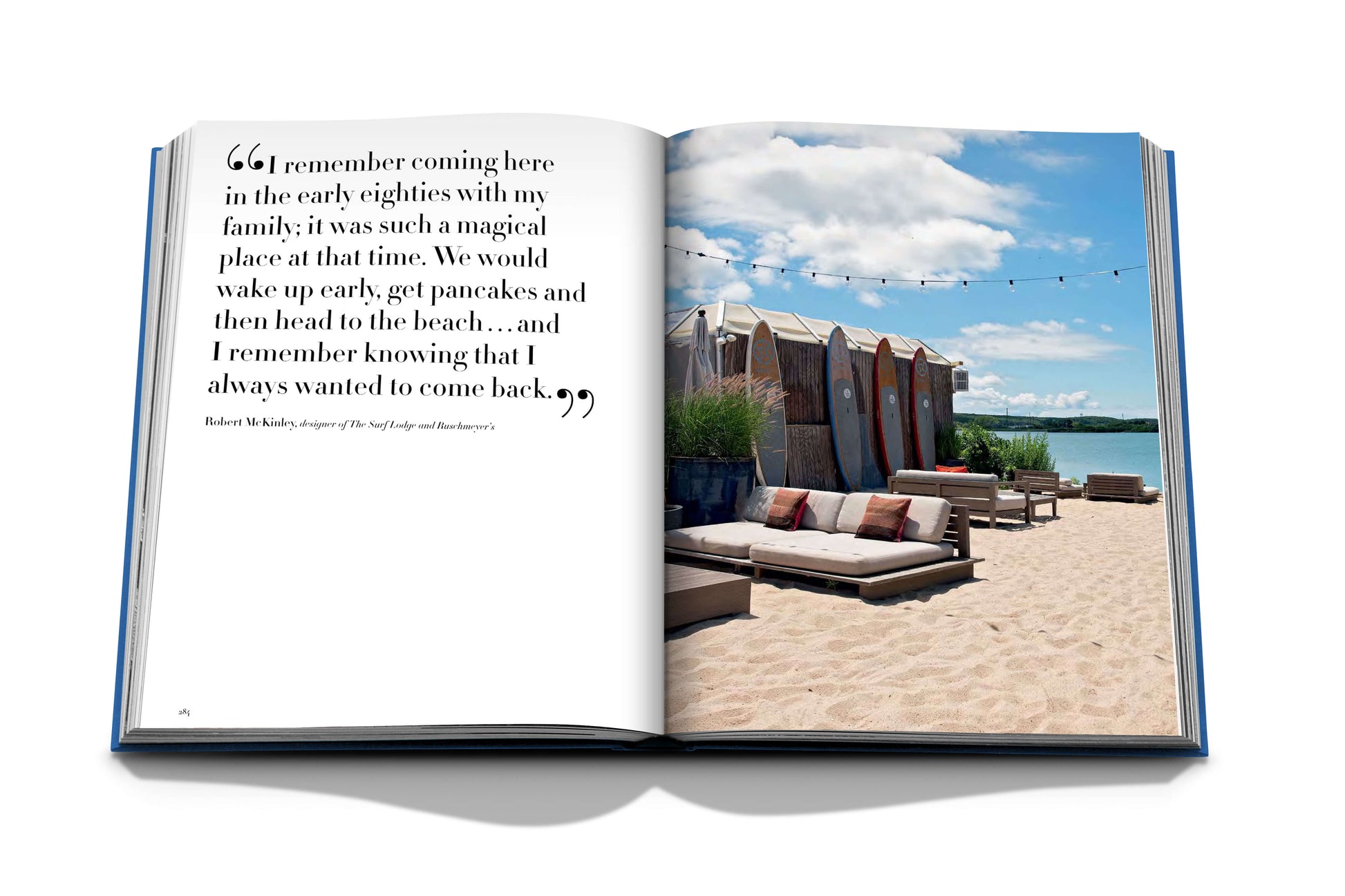 An open book of Hamptons Private with an image of a beach and chairs, perfect for leisure by Assouline.