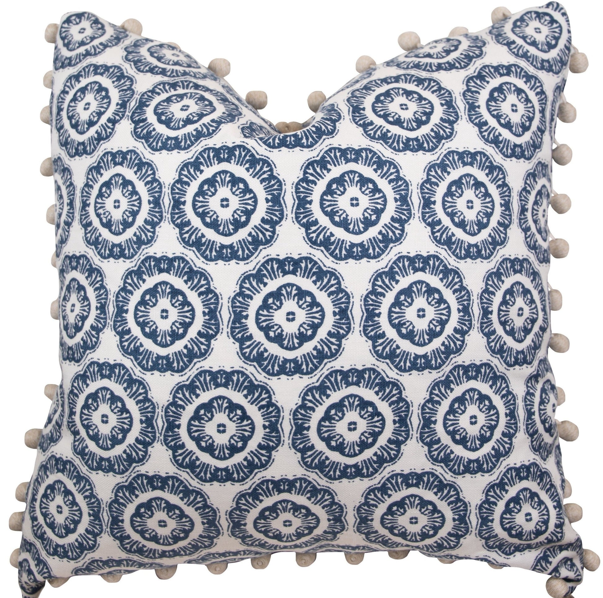 The Tassel Inverted Medallion Navy Pillow by Hive Custom Pillows features a blue and white floral design with pom-pom trim, handmade in the USA.
