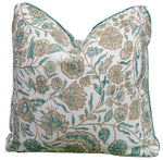 The Cormnandal Teal Pillow by Hive Custom Pillows features a handmade floral pattern in teal, green, and beige on white, adding charm and comfort to any space.
