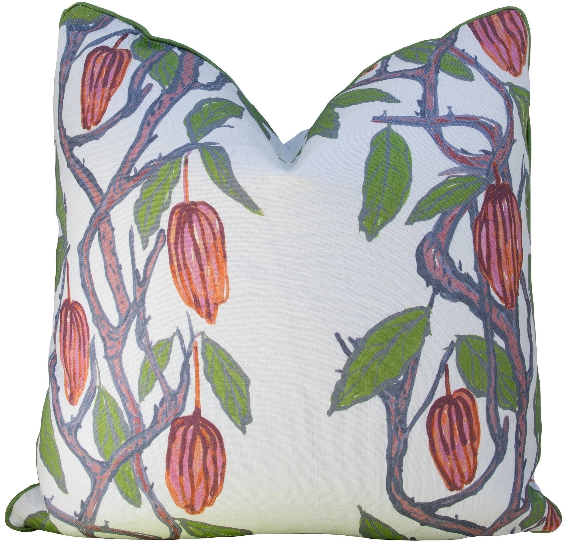 The Hive Custom Pillows' Cacao Shale Rose Pillow features cocoa pods with green leaves on a white background. This double-sided, handmade piece is crafted in the USA and filled with luxurious down for ultimate comfort.