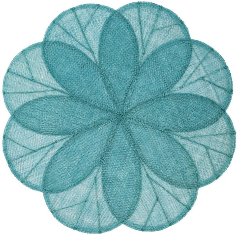 The Sinamay Flower Placemat Collection Set by Deborah Rhodes features teal, flower-shaped placemats with overlapping petals and visible stitching, crafted from sheer woven abaca fibers, shown on a white background.