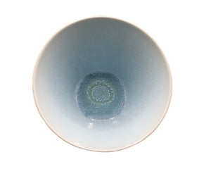 Top view of the Jars France Vuelta Ocean Blue Serving Bowl by Jars, featuring an iridescent glaze and a textured pattern in the center.