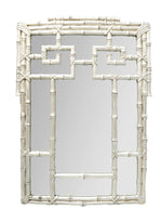 The Bamboo Mirror by Carvers' Guild features an aluminum silver frame with oriental-inspired geometric patterns and intersecting lines.