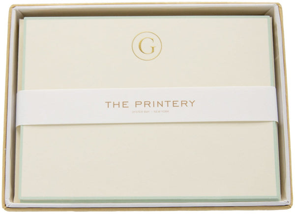 A Printery - Note Card Box Set with a G-Initial Letter with Aqua Border in it.