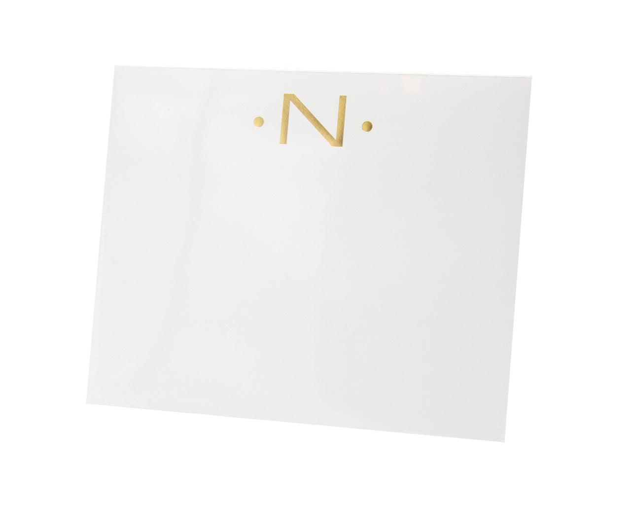 The Black Ink Gold Initial Large Notepad features a gold letter "N" centered between two gold dots near the top on high-quality white paper.