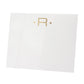 The Black Ink Gold Initial Large Notepad features a white, heavyweight square card with a gold letter "R" centered between two small gold dots.