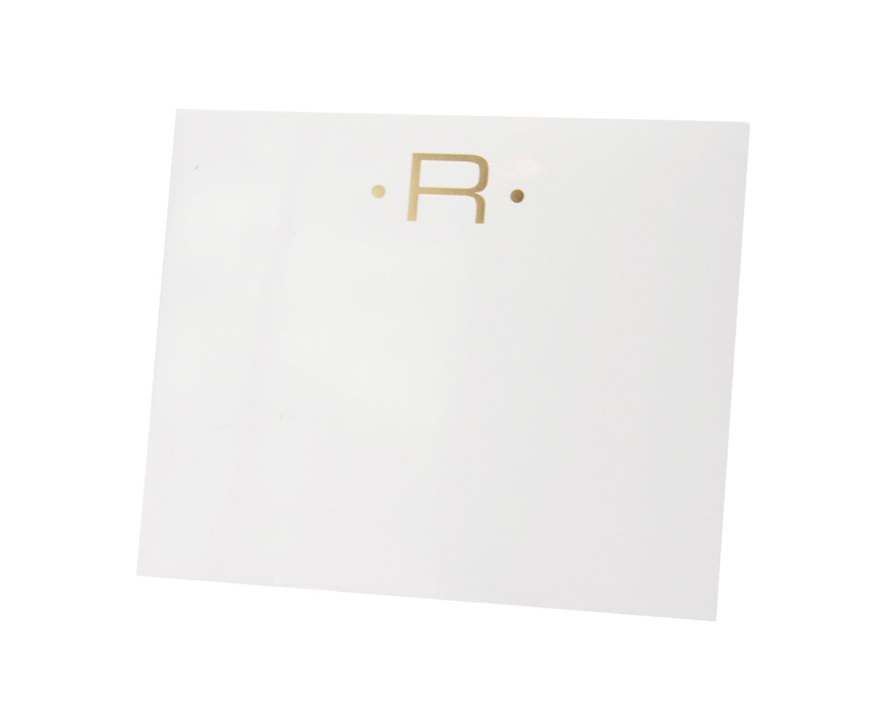 The Black Ink Gold Initial Large Notepad features a white, heavyweight square card with a gold letter "R" centered between two small gold dots.