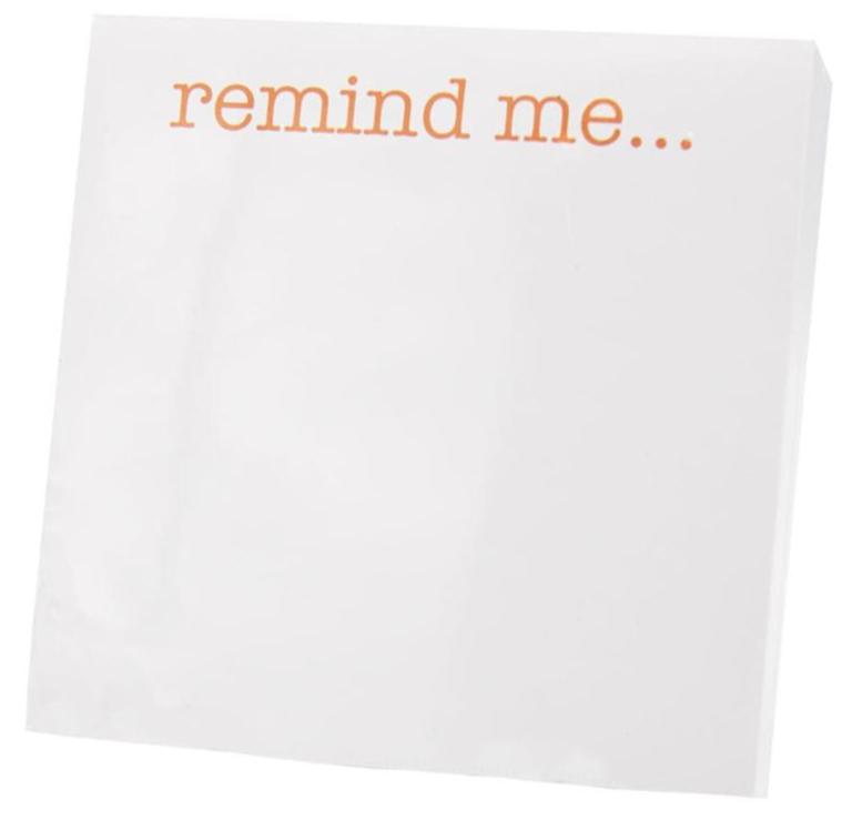The Black Ink Remind Me Small Paddie is a white notepad featuring "remind me..." in orange at the top, crafted with luxurious quality paper for a premium writing experience.