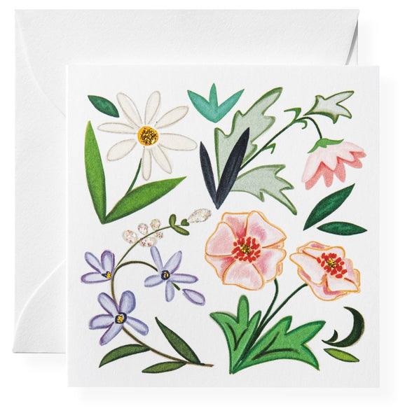 A Karen Adams greeting card decorated with flowers.