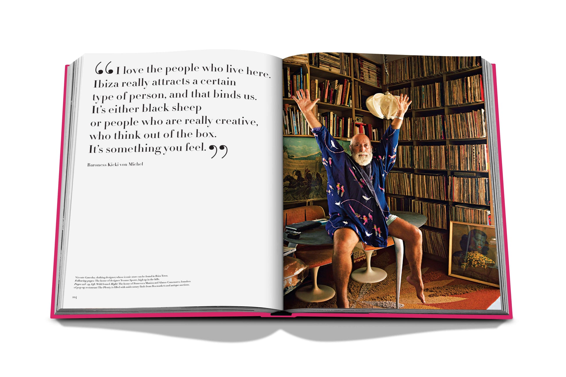 An open book displaying a photograph of an elderly man, arms raised in jubilation, seated amid a vast collection of books, with an inspiring quote on the left page about Assouline Ibiza Bohemia.