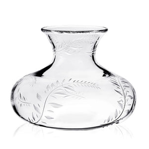 The Jasmine Flower Centre Vase, 11" by William Yeoward Crystal is a handmade clear glass vase with a wide base, narrow neck, and etched leaf and vine design—an elegant touch for any space.