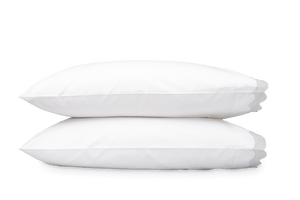 Two pillows from the Matouk Lorelei Bedding Collection in silver are stacked atop each other against a plain background, showcasing an artisanal look.