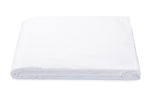 A Matouk Luca 17" Fitted Sheet in white, made from Egyptian cotton percale with a 500 thread count, is neatly folded on a plain background. This bedding essential is OEKO-TEX® Standard 100 certified for quality and safety.