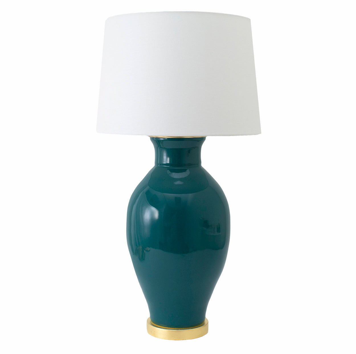 The Matagorda Glossy Mallard Lamp by Paul Schneider Ceramics features a glossy dark teal ceramic base with a gold accent, dimmer socket for adjustable lighting, and a white fabric shade.