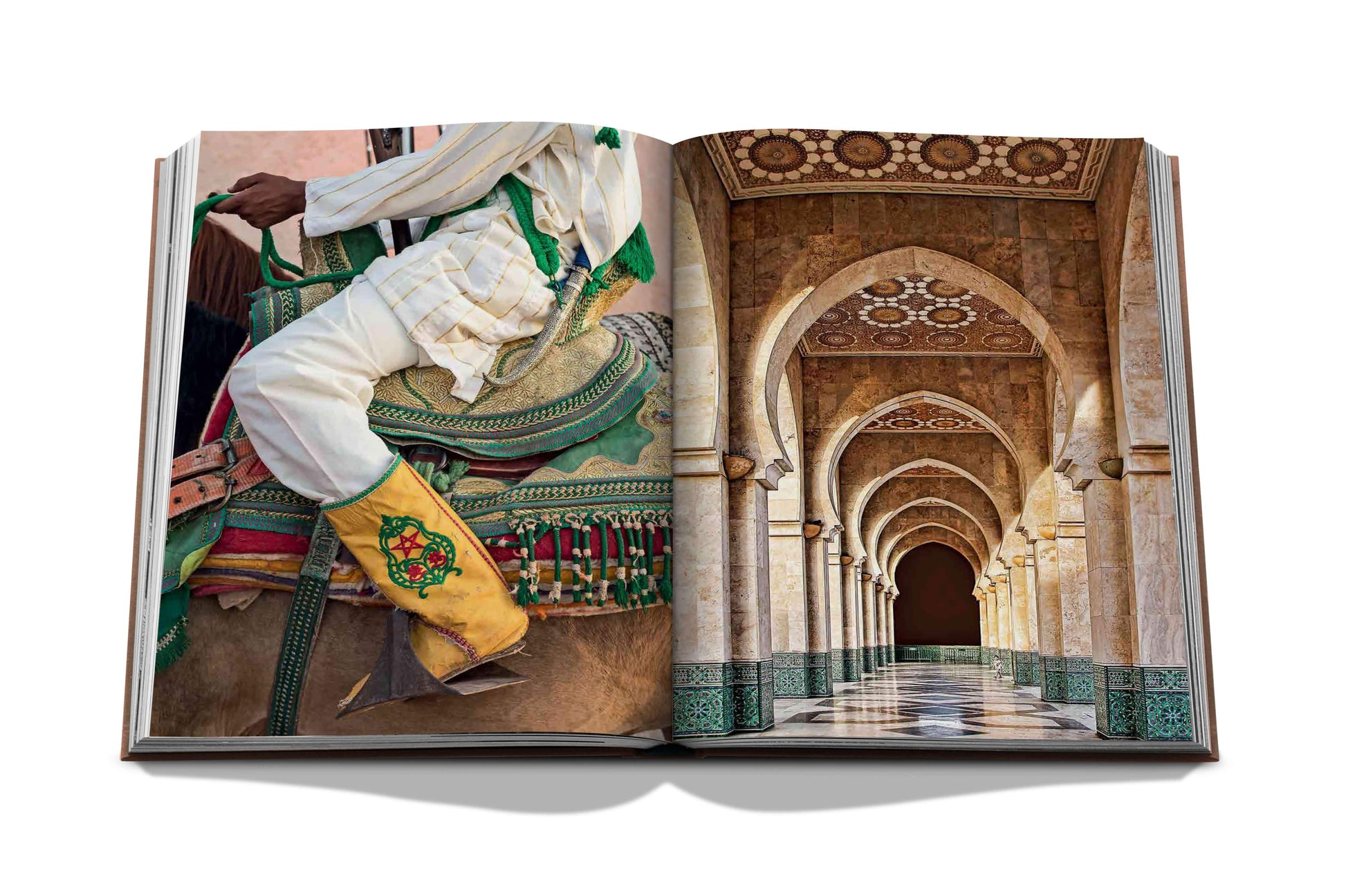 An open book featuring Marrakech Flair by Assouline, showcasing a printed image that seamlessly transitions from an illustration of a traditionally dressed rider on a horse, showcasing Moroccan arts, to a photograph of an ornate arched corridor in Yves Saint.