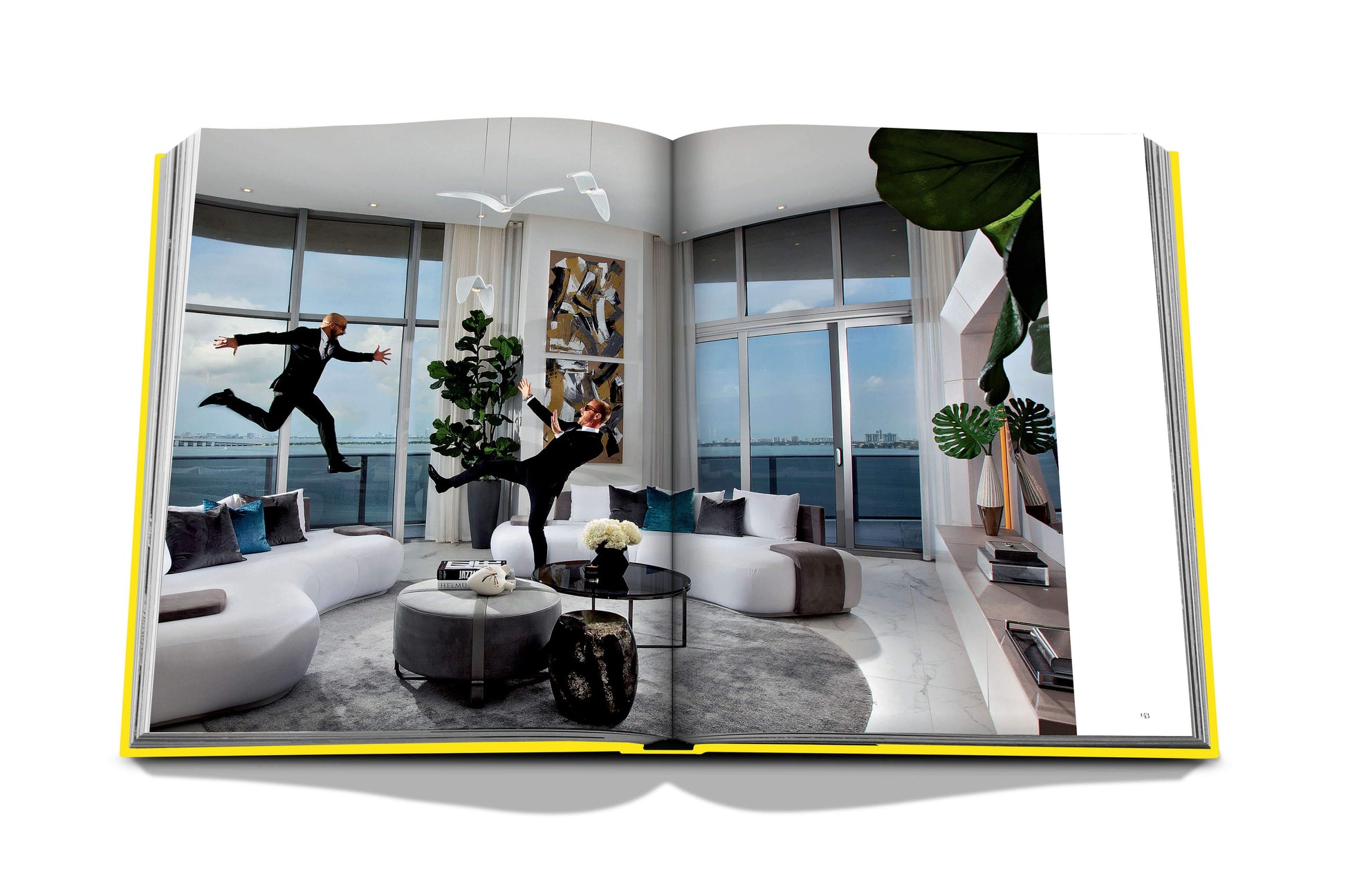 An open book with a man jumping in the air, depicting the lively *Miami Beach* life by Assouline.