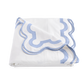A white and blue blanket crafted from luxurious Egyptian cotton percale, featuring a 600 thread count for ultimate comfort: Matouk Mirasol Bedding Collection, Azure by Matouk.