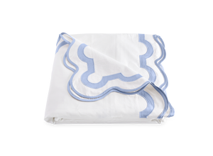 A white and blue blanket crafted from luxurious Egyptian cotton percale, featuring a 600 thread count for ultimate comfort: Matouk Mirasol Bedding Collection, Azure by Matouk.