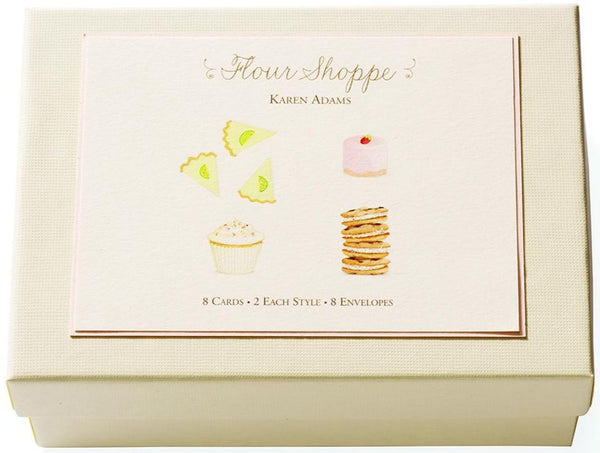 A hand-embellished white box filled with a variety of desserts, perfect as a hostess gift or accompanied by Karen Adams - Note Card Box Set.