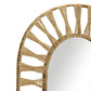 The Ojai Oval Mirror by Selamat features a sunburst-inspired frame woven from natural jute fibers, offering an organic vibe.