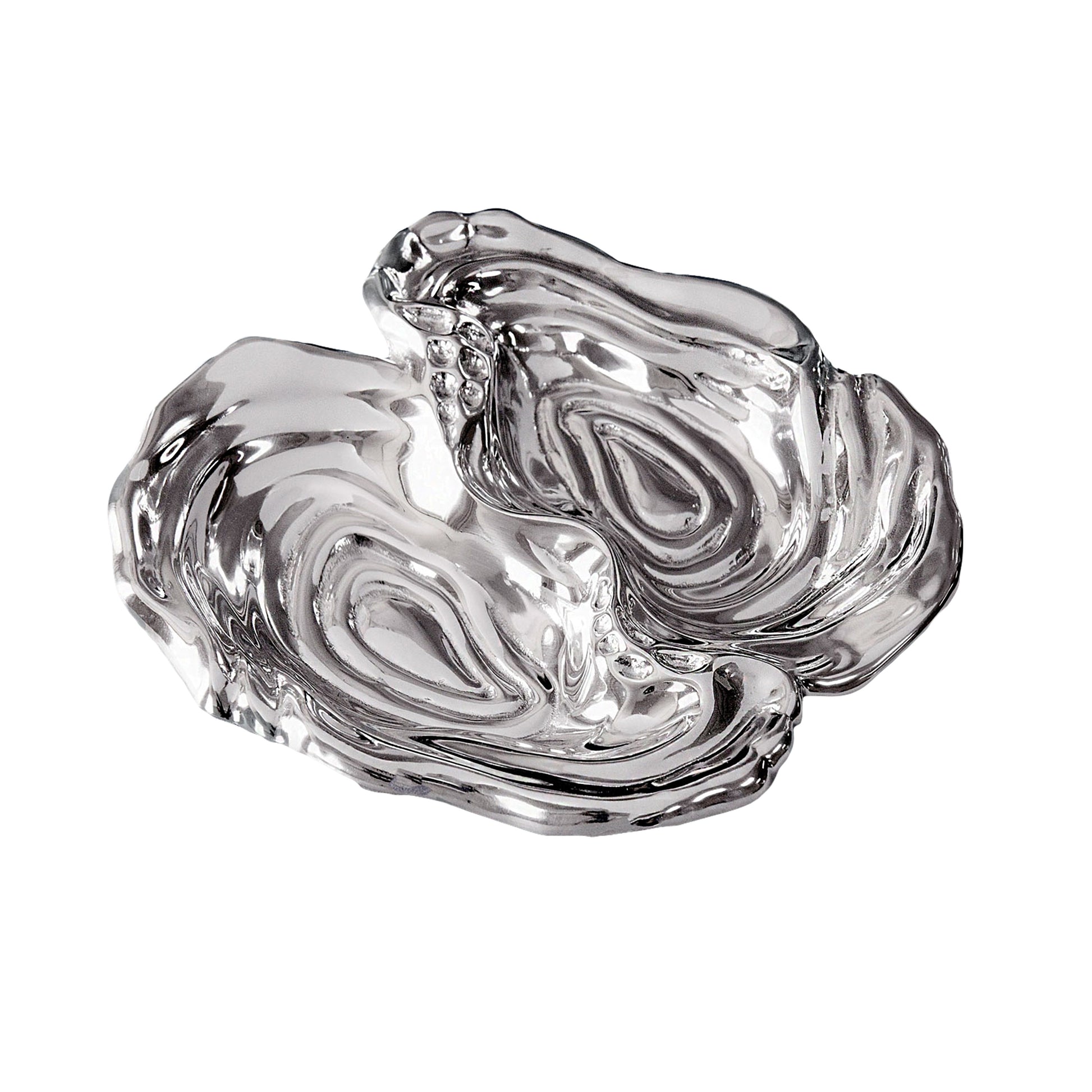 The Beatriz Ball Ocean Oyster Double Dip is a clear glass dish with an abstract organic shape, featuring two sections and a glossy finish, inspired by handmade artistry.