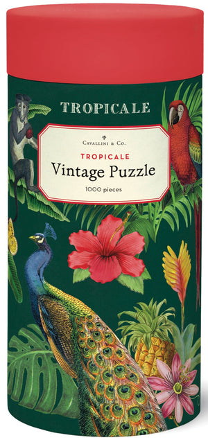 The Cavallini Papers and Co Tropicale 1,000 Piece Puzzle comes in a cylindrical container with vibrant peacock, parrot, and monkey illustrations, and includes a handsewn muslin bag for an extra charming touch.