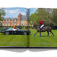 An open book with a spread showing a man leaning against a classic car and another on horseback with a polo mallet, set against the backdrop of a stately mansion and polo grounds for Polo Heritage by Assouline.