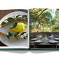 An open Punta Del Este book by Assouline with a picture of a beach resort table with lemons on it.