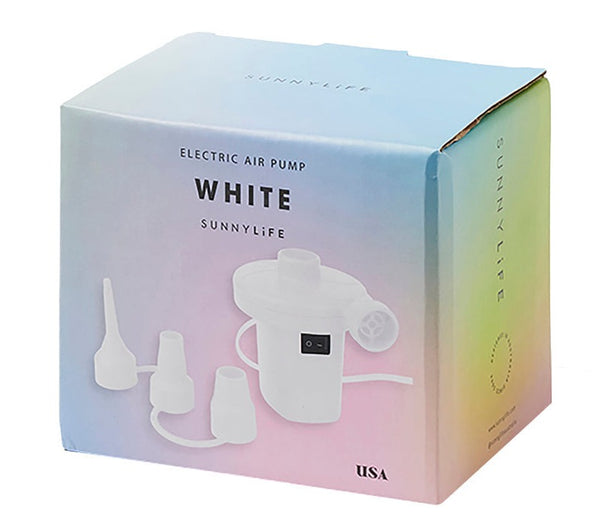 Box of a Sunnylife White Electric Air Pump, featuring the pump and three nozzle attachments. The pastel-colored packaging hints at pool floats, with a visible USA label.