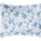 A rectangular pillow from Matouk’s San Cristobal Bedding Collection, Sky, features scalloped edges, Luca Egyptian cotton percale, and Schumacher’s blue floral and vine pattern on a white background.