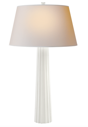 The Visual Comfort Fluted Spire Large Table Lamp features a tall, plaster white base with a wide natural paper shade and supports E26 dimmer wattage bulbs.