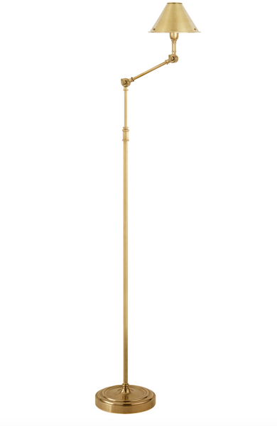 A Visual Comfort Anette Floor Lamp, Natural Brass with an arm and a shade, featuring an E12 Candelabra socket and a convenient foot switch.