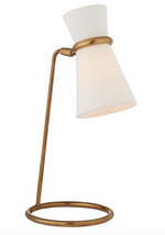 The Clarkson Table Lamp by Visual Comfort in antique brass features a circular base and a white, funnel-shaped shade. It includes an E12 keyless socket, ideal for a 40-watt bulb.