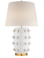 A Linden Medium Table Lamp, Plaster White with a gold shade, measuring 26.5" H X 17" W, by Visual Comfort.