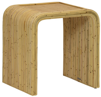 The Yosemite Falls Side Table by Selamat features a graceful curved design with a woven cane top and vertical slat legs.