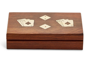 A Two's Company wooden box with inlaid brass playing card suits design on its lid.