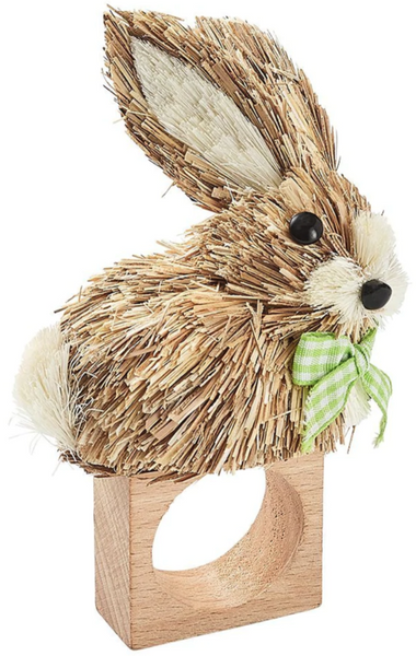 Easter table decorative straw bunny with a green bow perched on a wooden stand, such as the Kim Seybert Hop Napkin Ring.