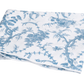 Folded Matouk San Cristobal Bedding Collection, Sky chinoiserie-style toile de jouy patterned fabric.