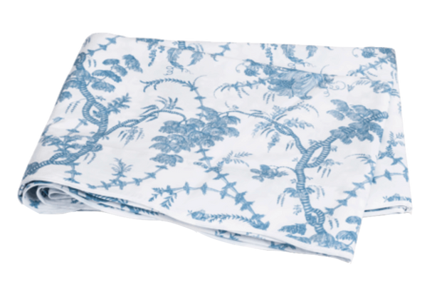 Folded Matouk San Cristobal Bedding Collection, Sky chinoiserie-style toile de jouy patterned fabric.