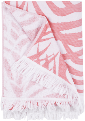 The Matouk Zebra Palm Beach Towel in Flamingo showcases a bold, abstract zebra-striped pattern in pink and white, artfully displayed to reveal both sides.