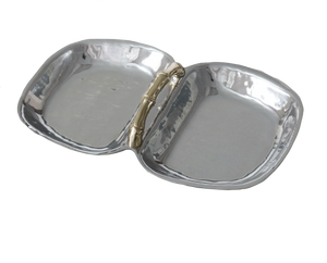 The Beatriz Ball Garden Bamboo Double Dip Tray with Gold Handles features two hand-polished silver sections and a central gold handle, beautifully displayed against a solid black background.