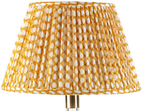 A John Rosselli Fermoie Wicker Lamp Shade in Marigold with polka dots.