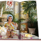 A Palm Beach picture book with a woman sitting at a table in an exclusive resort by Assouline.