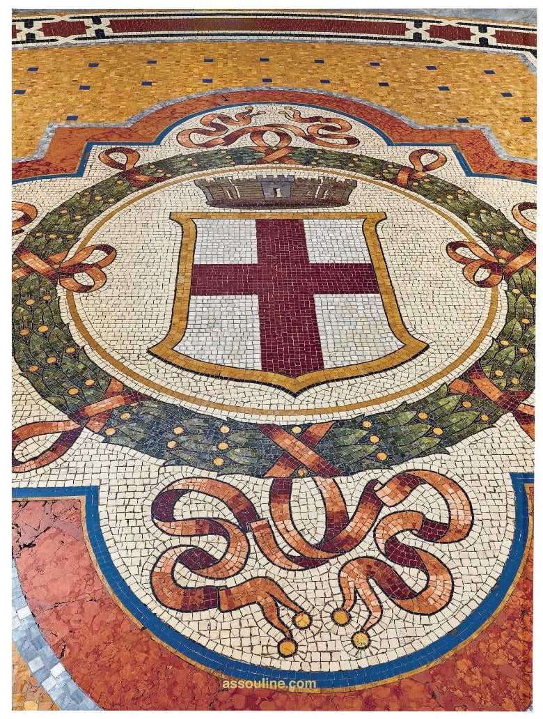 Intricate mosaic floor featuring a coat of arms with a red cross and decorative borders, embodying Assouline Milan Chic.