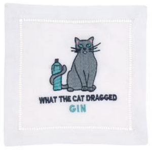 August Morgan’s “What The Cat Dragged Gin Cocktail Napkins” feature classic hemstitching and a gray cat embroidered beside a gin bottle, with playful text—perfect for cat lovers and cocktail enthusiasts alike.