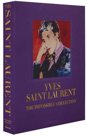 A book titled "The Impossible Collection: Yves Saint-Laurent" by Assouline with a portrait on the cover.