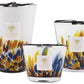 Set of three Baobab Rainforest Mayumbe Candle Collection candles in varying sizes with a vibrant, feather-like pattern and a tropical forest fragrance.