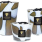 Three scented Baobab Collection Stones Agate Candles with metallic silver and gold patterned exteriors, each of varying sizes, displayed against a white background.